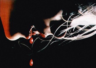 Woman vampire and a drop of blood