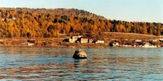 Shaman boulder at Angara against Listvianka